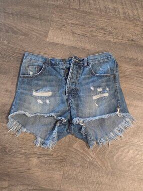 One Teaspoon Outlaws Distressed Denim Shorts.